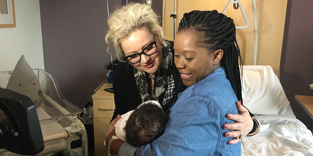 Minister for Health Jill Hennessy with mum Nathalie Delahunty and her newborn son Micah