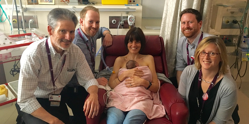 The Women's Neonatal Research Team: Prof Peter Davis, Dr Brett Manly, Dr Calum Roberts and Dr Louise Owen with mum Celia and her newborn Eli