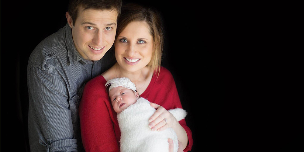 Baby Evie with parents Jodie and Aden