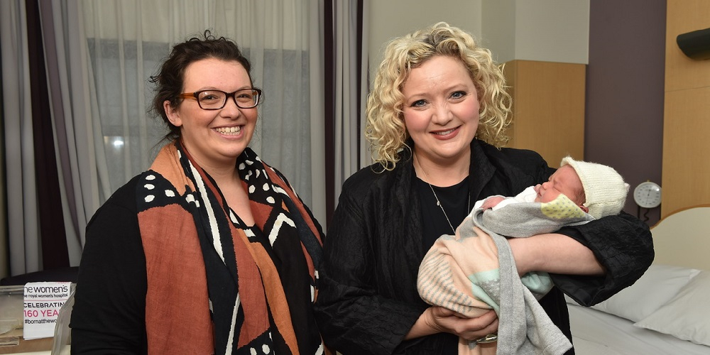 Health Minister Jill Hennessy (right) with baby Elsie and mum Sonia at the Women's 